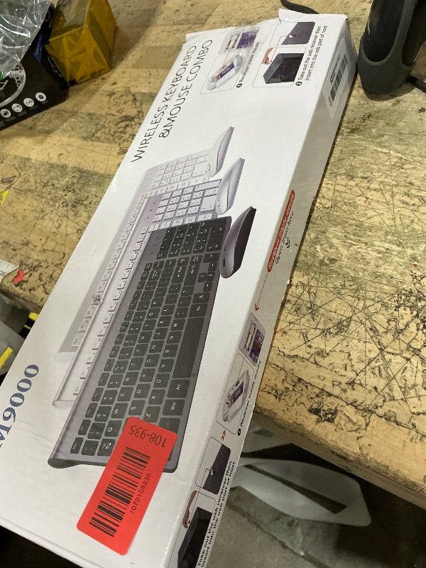Photo 1 of **HAS ISSUES FUNCTIONING POSSIBLY FOR PARTS** Wireless Keyboard and Mouse Ultra Slim Combo, TopMate 2.4G Silent Compact USB 2400DPI Mouse and Scissor Switch Keyboard Set with Cover, Batteries Included, for PC/Laptop/Windows/Mac - Gray Black