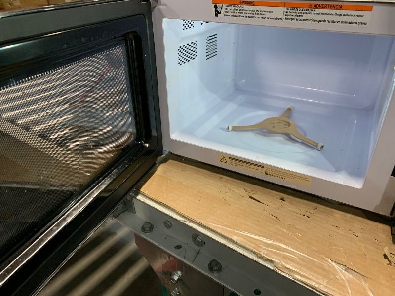 Photo 1 of **DIRTY, MISSING MICROWAVE PLATE AND TURNTABLE RING** TOSHIBA EM131A5C-BS Countertop Microwave Ovens 1.2 Cu Ft, 12.4" Removable Turntable Smart Humidity Sensor 12 Auto Menus Mute Function ECO Mode Easy Clean Interior Black Color 1000W