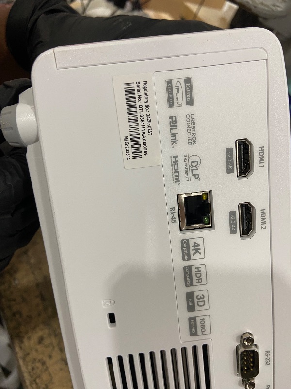 Photo 1 of **FOR PARTS, ITEM TURNS ON BUT DOES NOT FUNCTION**
Optoma UHZ35 High Brightness 4K UHD HDR Home Theater and Gaming Laser Projector