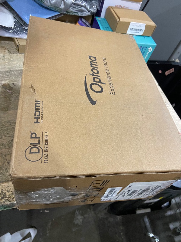 Photo 1 of **FOR PARTS, ITEM TURNS ON BUT DOES NOT FUNCTION**
Optoma UHZ35 High Brightness 4K UHD HDR Home Theater and Gaming Laser Projector