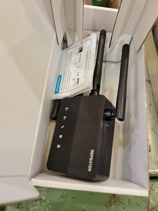 Photo 1 of 1200Mbps Dual Band 5GHz/2.4GHz WiFi Extender, WiFi Extender Signal Booster, 12880 Sq.Ft Coverage, 105-Device Support, Setup for Home & Outdoor Use