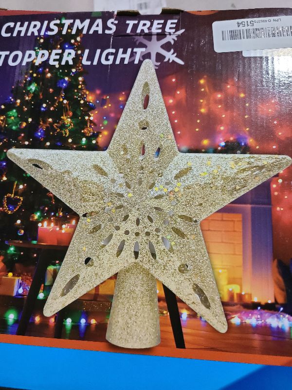 Photo 1 of 10" Christmas Tree Topper Projector with 6 Projection Modes, Built-in LED Rotating Light, 3D Glitter Dynamic Projector Light Up Xmas Tree Topper Star for Christmas Holiday Party Decorations Gifts