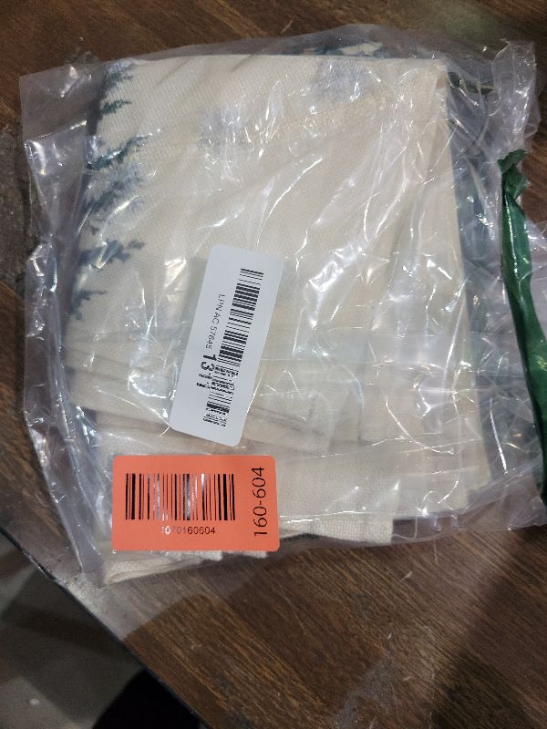 Photo 1 of Artoid Mode Beige Pine Tree Snowflake Merry Christmas Placemats Set of 4, 12x18 Inch Seasonal Winter Xmas Holiday Table Mats for Party Kitchen Dining Decoration