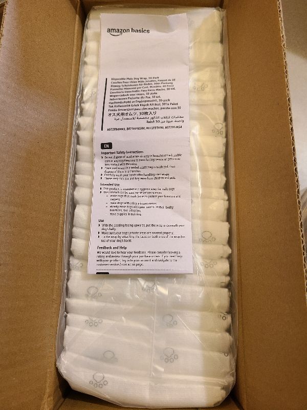 Photo 1 of Amazon Basics Absorbent, Leakproof Male Dog Wrap Disposable Diapers, Small, Pack of 50, White