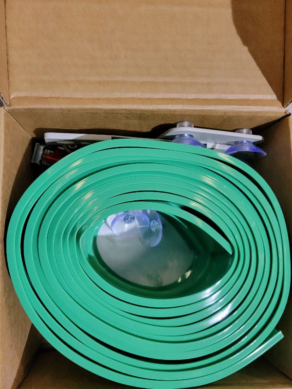 Photo 1 of 15.75 Ft Flex Track for Kids, Flexible Race Track Compatible with Hot Wheels and Diecast 1/64th Cars, Roll-Up Portable Race Car Ramp Track with Suction Cups & Track Anchors & 4 Race Cars, Green