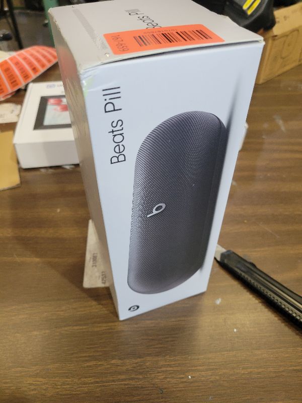 Photo 1 of Beats Pill - Portable Bluetooth Speaker - Up to 24H Battery Life, Water Resistant, Bluetooth, Apple & Android Compatible, Seriously Loud Sound for Home, Outdoor and Travel - Matte Black