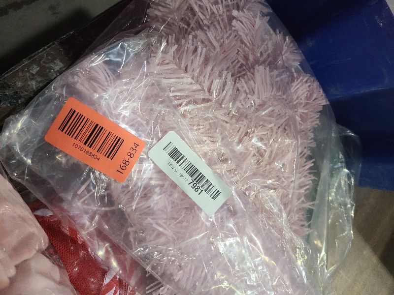 Photo 1 of 2ft Pink Artificial Christmas Tree,Mini Tabletop Xmas Pine Tree with 80 Branch Tips and Plastic Stand for Indoor and Outdoor Decoration