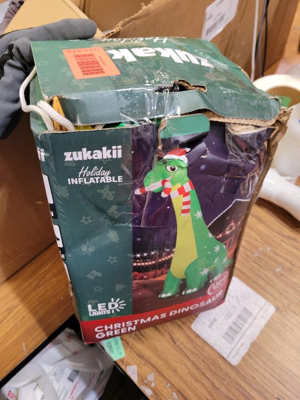 Photo 1 of 13FT Giant Dinosaur Christmas Inflatable Decorations, Built-in LED Lights, Strong Blower Huge Blow Up Yard Clearance Decor with Large Candy Cane Xmas Santa Hat Outdoor Indoor Holiday Party