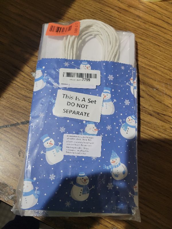 Photo 1 of 18 Pieces Christmas Snowflake Gift Bag Winter Wonderland Paper Party Goodie Bags with Snowflakes Snowman Deer Merry Christmas Decor for Winter Xmas Party Birthday Decoration 6.3 x 8.66 x 3.15 Inch