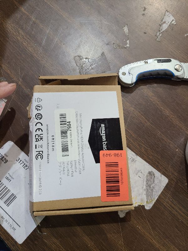 Photo 1 of Amazon Basics Mini DisplayPort Male to HDMI Male Cable, 1080p, Gold-Plated Plugs, 6 Foot, Black for Personal Computer