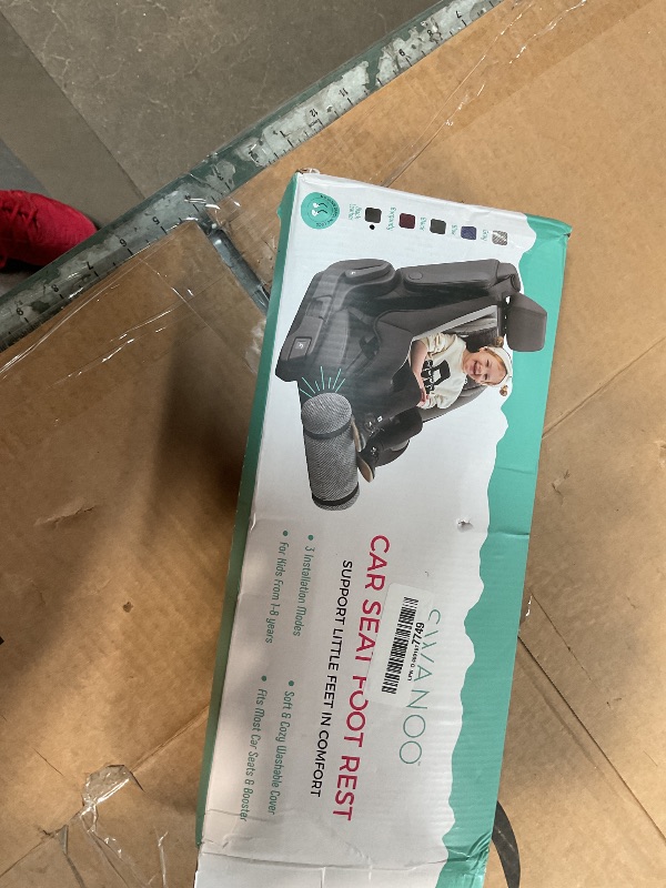 Photo 1 of **BROKEN**NO ZIPPER**SWANOO Car Foot Rest with Extra Long Straps - Adjusts to Any Carseat or Toodlers Booster Seat - Black Leather Leg Rest for Kids