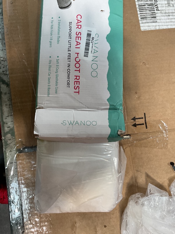 Photo 1 of **BROKEN**NO ZIPPER**SWANOO Car Foot Rest with Extra Long Straps - Adjusts to Any Carseat or Toodlers Booster Seat - Black Leather Leg Rest for Kids