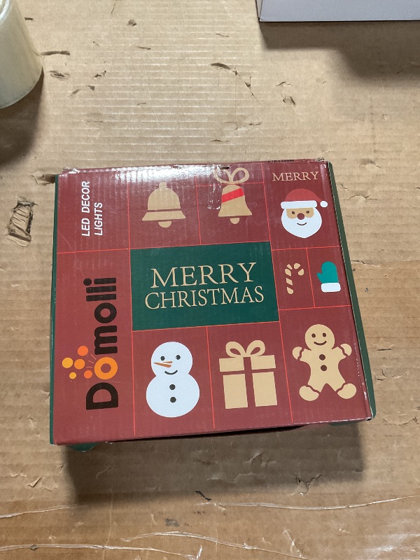 Photo 1 of *** MISSING REMOTE & OTHER PIECES**** Domolli Christmas Lights 1200 LED 394 FT, IP67 Waterproof Christmastree Lights with 8 Modes, Remote Control 3 Timers & Memory Function Xmas Decorations for House and Holiday (Multicolor)