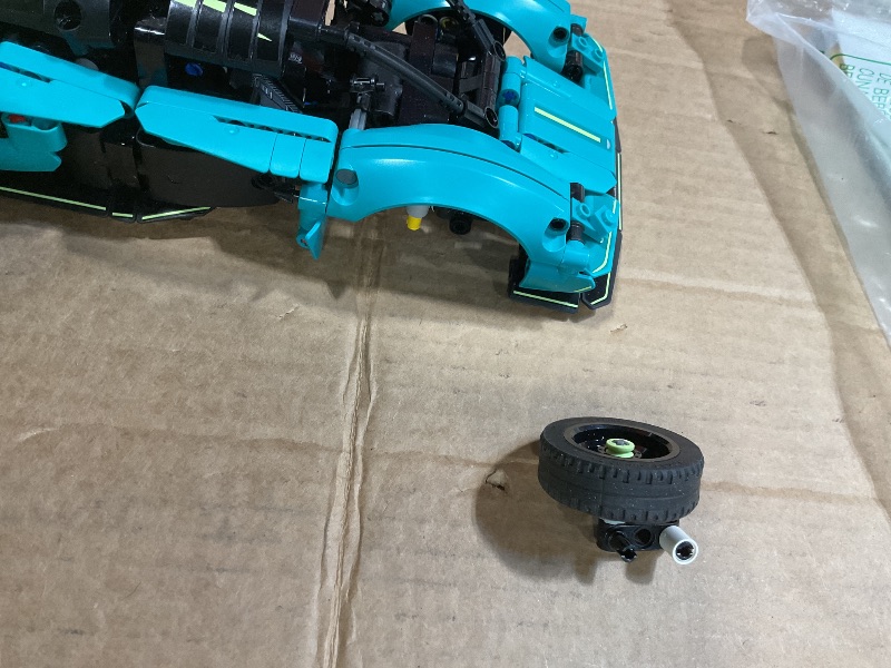 Photo 1 of **LOOSE PARTS**Lego car 