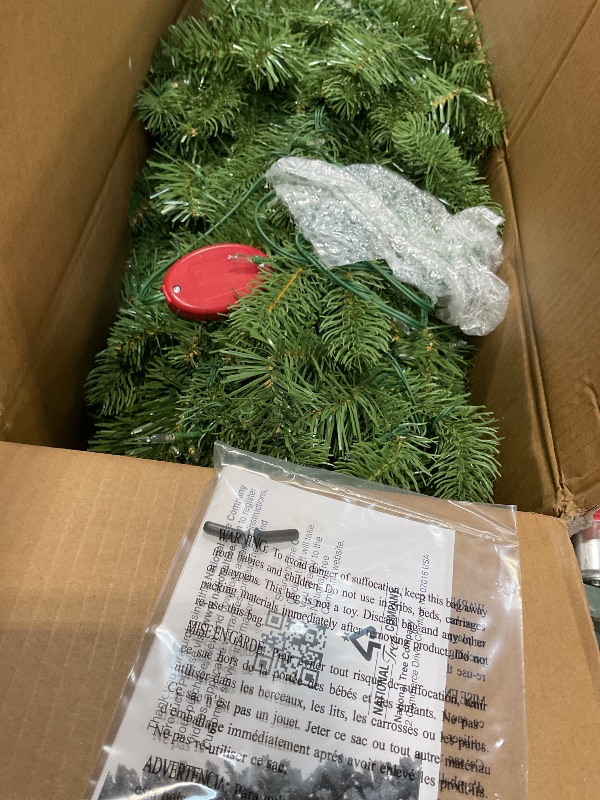 Photo 1 of ** RECOMENDED FOR PARTS /LIGHTS ARE NON-FUNCTIONAL IN 1 SECTION*** National Tree Company 7.5 ft Pre-Lit Downswept Douglas Fir Slim Artificial Christmas Tree, 350 LED Lights, 796 Tips, Foot Pedal, 10 Light Functions, Includes Stand, Green