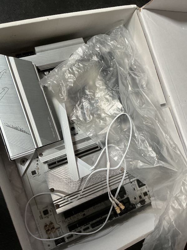 Photo 1 of **NON-FUNCTIONAL** GIGABYTE B650 AORUS Elite AX ICE AMD AM5 ATX Motherboard, Support Ryzen 9000/8000/7000 Series, DDR5, 12+2+2 Power Phase, PCIe 5.0 M.2, USB-C 3.2 Gen 2, WIFI6E, 2.5GbE, EZ-Latch, Q-Flash, RGB Fusion