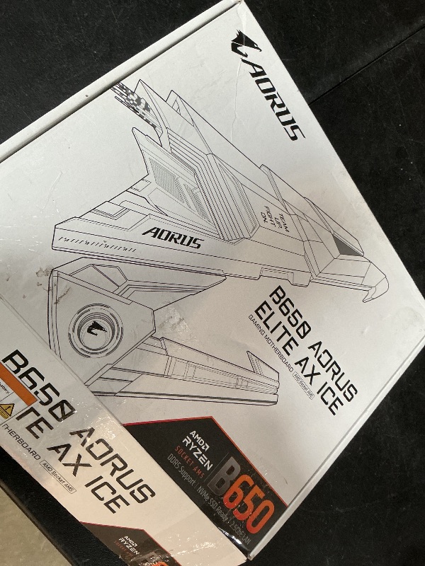 Photo 1 of **NON-FUNCTIONAL** GIGABYTE B650 AORUS Elite AX ICE AMD AM5 ATX Motherboard, Support Ryzen 9000/8000/7000 Series, DDR5, 12+2+2 Power Phase, PCIe 5.0 M.2, USB-C 3.2 Gen 2, WIFI6E, 2.5GbE, EZ-Latch, Q-Flash, RGB Fusion