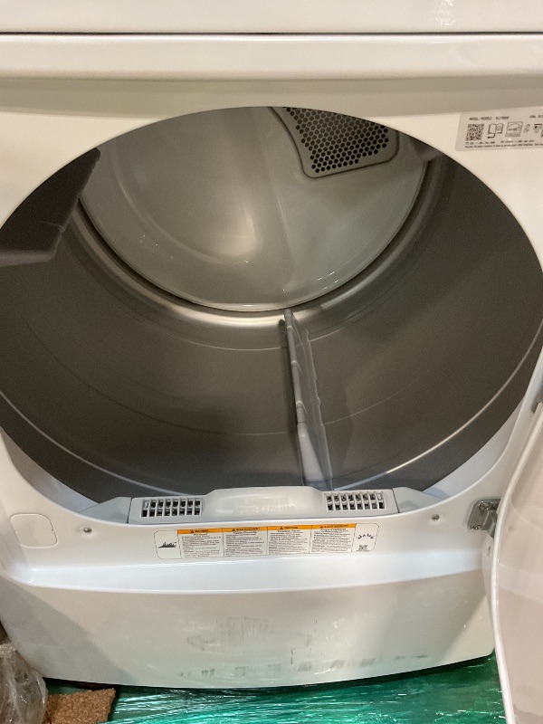 Photo 1 of **MISSING POWER CORD. MAJOR DENT. SCRAPES/DIRT**Lg 7.3 cu. ft. ultra-large capacity electric vented dryer