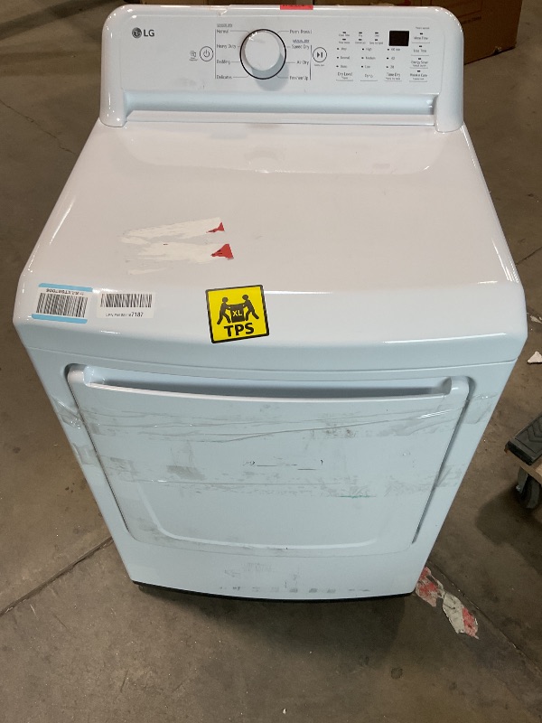 Photo 1 of **MISSING POWER CORD. MAJOR DENT. SCRAPES/DIRT**Lg 7.3 cu. ft. ultra-large capacity electric vented dryer