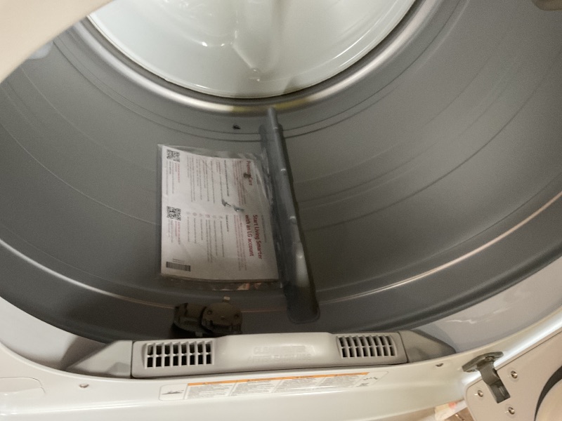 Photo 1 of **MISSING POWER CORD. MAJOR DENT. SCRAPES/DIRT**Lg 7.3 cu. ft. ultra-large capacity electric vented dryer