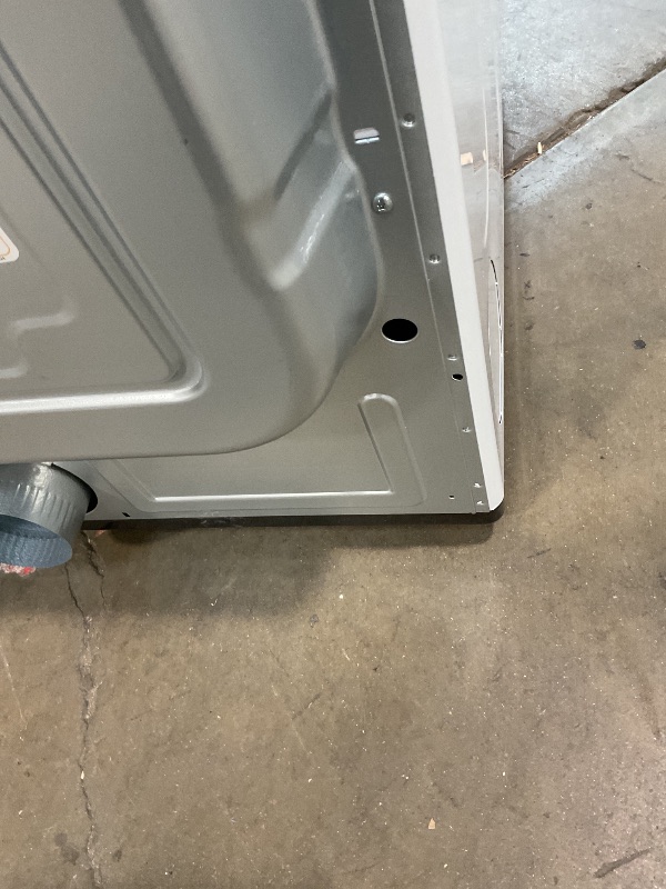 Photo 1 of **MISSING POWER CORD. MAJOR DENT. SCRAPES/DIRT**Lg 7.3 cu. ft. ultra-large capacity electric vented dryer