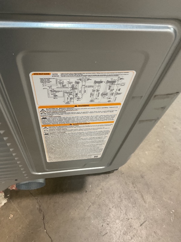 Photo 1 of **MISSING POWER CORD. MAJOR DENT. SCRAPES/DIRT**Lg 7.3 cu. ft. ultra-large capacity electric vented dryer