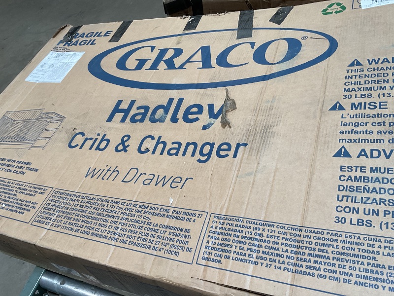 Photo 1 of ***DAMAGED***WOOD CHIPPED***
Graco Hadley 5-in-1 Convertible Crib & Changer – GREENGUARD Gold Certified, Fits Standard Crib Mattress, Converts to Toddler Bed and Full Bed, 4 Adjustable Mattress Heights (Pebble Gray)