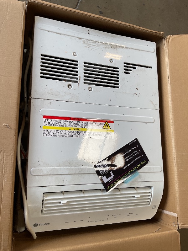 Photo 1 of *** USED/MAJOR DAMAGE/UNKNOWN MISSING PARTS OR HARDWARE ***GE Profile ClearView Inverter Window Air Conditioner Unit, 12,200 BTU, Energy Efficient Cooling up to 550 sq ft., Ultra Quiet, SMART Home Capable, Includes Remote, White