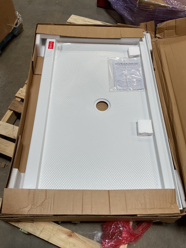Photo 1 of ***MINOR DAMAGE ***DreamLine SlimLine 32 in. D x 54 in. W x 2 3/4 in. H Center Drain Single Threshold Shower Base in White, DLT-1132540