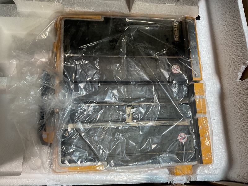 Photo 1 of *** FOR PARTS ONLY/ MISSING ASSEMBLY PIECES TO BE FUNCTIONAL &  SAW IS DAMAGED *** DEWALT Wet Tile Saw with Stand, 10-Inch, Corded (D24000S)