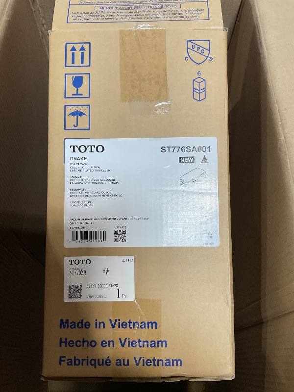 Photo 1 of **TANK AND LID ONLY**TOTO Drake Two-Piece Elongated 1.6 GPF Universal Height TORNADO FLUSH Toilet with CEFIONTECT, Cotton White - CST776CSFG#01