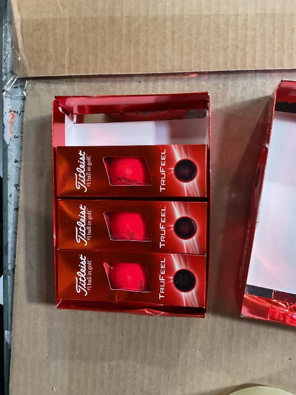 Photo 1 of * TOTAL: 9, NOT A DOZEN * Titleist TruFeel Golf Balls, Matte Red (One Dozen)