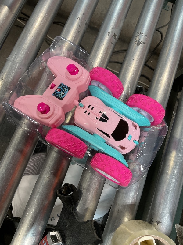 Photo 1 of **FOR PARTS ONLY/ DAMAGED (BROKEN)** QUNREDA RC Cars, Pink Remote Control Car for Girls, 2.4 GHZ Double Sided RC Stunt Car 360° Rotating Remote Control Crawler with Headlights Car Toys for 6 7 8 9 10 11 12 Girls Birthday Gift Grandkids