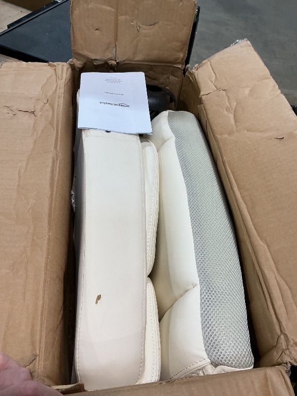 Photo 1 of **FOR PARTS/ MATERIAL HAS HOLES/ MISSING ASSEMBLY HARDWARE*** Amazon Basics Classic Puresoft PU Padded Mid-Back Office Chair with Armrest, Height Adjustable, Easy to Assemble, 26"D x 23.75"W x 42"H, Cream
