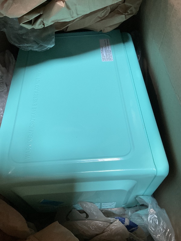 Photo 1 of **FOR PARTS ONLY/ NON-FUNCTIONAL** Galanz GLCMKZ07GNR07 Retro Countertop Microwave Oven with Auto Cook & Reheat, Defrost, Quick Start Functions, Easy Clean with Glass Turntable, Pull Handle.7 cu ft, Green