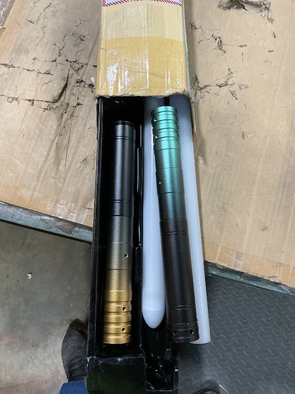 Photo 1 of **POSSIBLY FOR PARTS / MISSING ASSEMBLY PIECES*** VEVOR Light Sword, 2 Pack Light up Sword with 12 RGB Colors, 4 Sound Modes and Realistic Handle, Rechargeable Toy for Adults and Kids, Christmas Day, Halloween Cosplay, Birthday