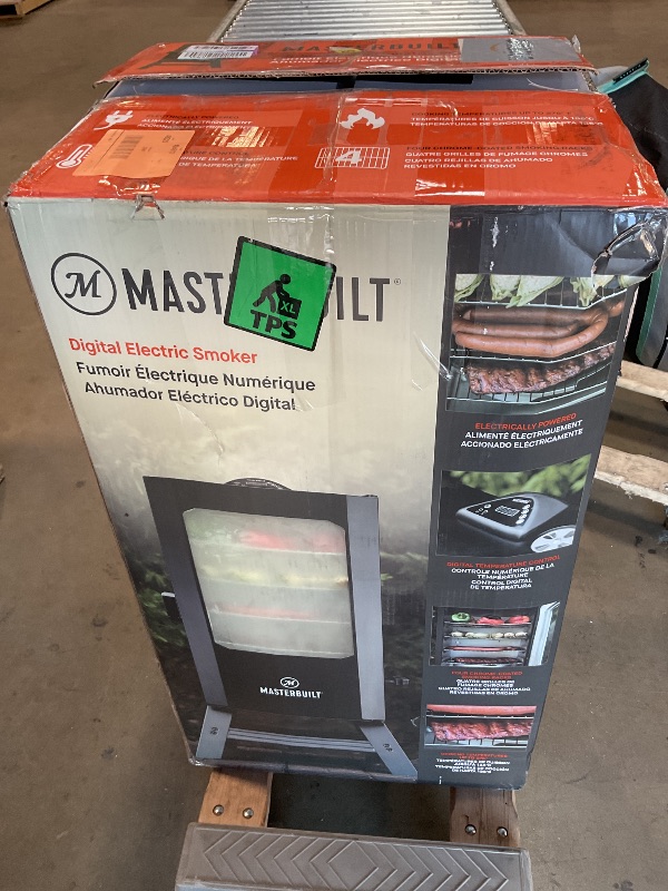 Photo 1 of *** USED/MINOR DAMAGE/NO MISSING PARTS OF HARDWARE***Masterbuilt® 30-inch Digital Electric Vertical BBQ Smoker with Leg Kit, Side Wood Chip Loader and 710 Cooking Square Inches in Black, Model MB20070421