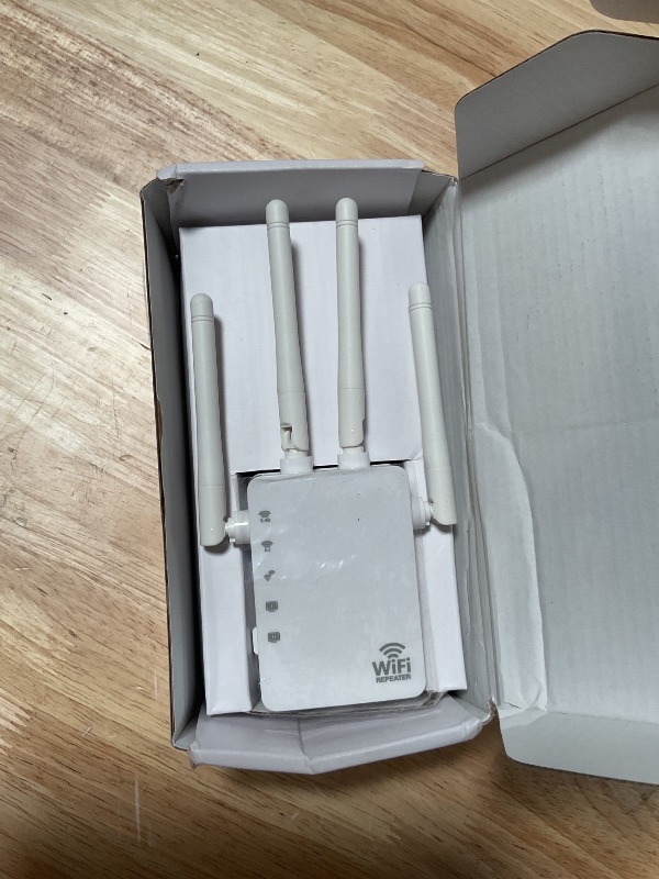 Photo 1 of 1.2Gbps Dual Band WiFi Extender, EasyMesh Compatible, 12880 Sq.Ft Coverage, WiFi Extender Signal Booster Supports 105 Devices with one Ethernet Port