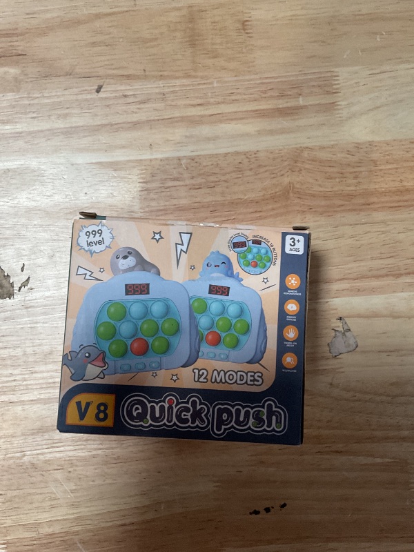 Photo 1 of **FOR PARTS ONLY/ BROKEN*** Quick Push Pop Game Fidget Toys, 12 Modes LED Screen Light Up Fast Push Bubble Game, Handheld Speed Pushing Game, Christmas Toys Gifts for 6 7 8 9 10 11 12 Years Old Kids Stocking Stuffers?Dinosaur?