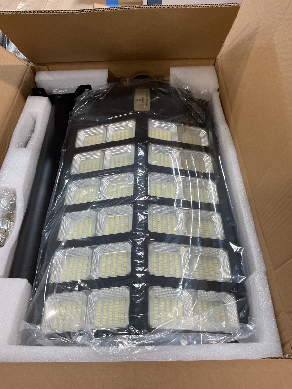 Photo 1 of **FOR PARTS ONLY/ NON-FUNCTIONAL*** Deepn 8000W Solar Street Light, 480000 Lumens Dusk to Dawn LED Flood Lights Outdoor Motion Sensor, IP66 Waterproof Commercial Grade Solar Outdoor Lights with Remote Control for Parking Lot