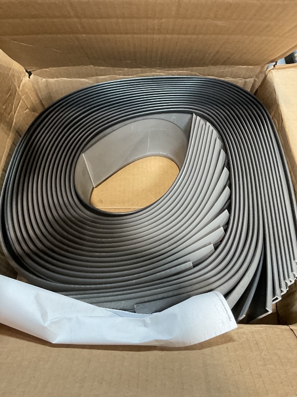 Photo 1 of *** PICTURE FOR REFERENCE ONLY/MINOR DAMAGE /CHARCOAL***Mohawk Vinyl Cove Wall Base Molding Trim in Charcoal 4” Vinyl Cove; 48” Lengths; 30 Pieces (120’) per Carton