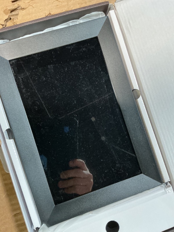 Photo 1 of **DAMAGED SCREEN** Frameo Digital Picture Frame, 10.1 Inch Smart WiFi Photo Frame with 1280x800 HD IPS Touch Screen, Auto-Rotate, Wall Mountable, Share Photos/Videos Instantly via App from Anywhere
