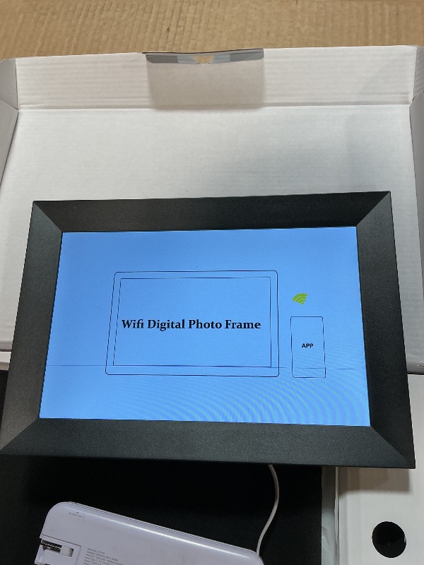 Photo 1 of **DAMAGED SCREEN** Frameo Digital Picture Frame, 10.1 Inch Smart WiFi Photo Frame with 1280x800 HD IPS Touch Screen, Auto-Rotate, Wall Mountable, Share Photos/Videos Instantly via App from Anywhere