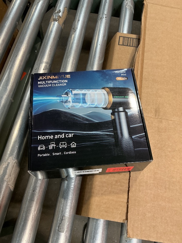 Photo 1 of **NON-FUNCTIONAL** Small But Mighty: Handheld Vacuum That Sweeps The House Clean