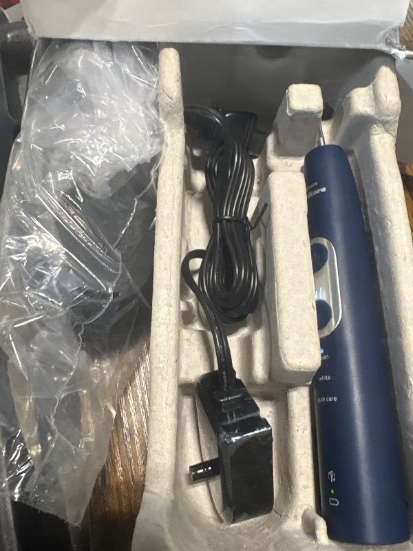 Photo 1 of Philips Sonicare ProtectiveClean 6100 Rechargeable Electric Toothbrush, with Pressure Sensor, 3 Cleaning Modes, SmarTimer and QuadPacer, 14-Day Battery Life, Travel Case, Navy Blue, Model HX6871/49