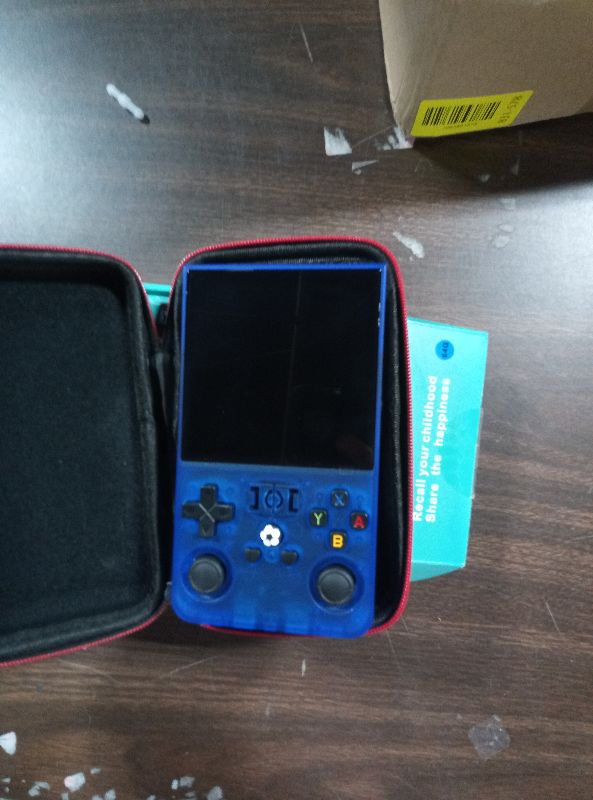Photo 1 of ?R36MAX 4000mAh Portable Rechargeable Handheld Retro Game Console,Comfort Non-Slip Handheld Standing Retro Game Console with 64G TF Car,4.0-inch Screen,for Office,Blue