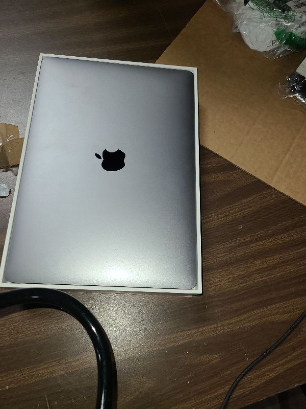 Photo 1 of 2020 Apple MacBook Air Laptop: Apple M1 Chip, 13” Retina Display, 8GB RAM, 256GB SSD Storage, Backlit Keyboard, FaceTime HD Camera, Touch ID. Works with iPhone/iPad; Space Gray