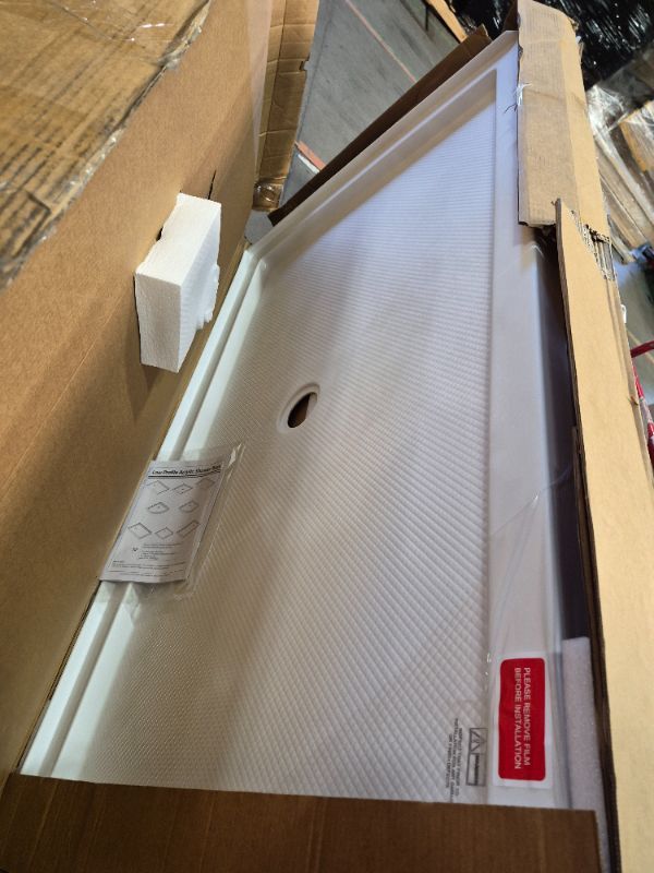 Photo 1 of **has a minor crack******************
DreamLine SlimLine 36 in. D x 60 in. W x 2 3/4 in. H Center Drain Single Threshold Shower Base in White, DLT-1136600