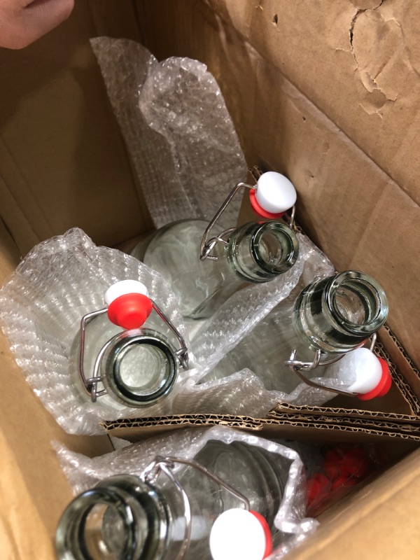 Photo 1 of ***PARTIAL SET - PRICE ADJUSTED*** 8 Pack [1 L / 33 fl. oz.] Swing Top Glass Bottles w/ Airtight Stopper Lids – Flip Top Brewing Bottle for Fermentation, Kombucha, Mead, Vinegar, Beer, Kefir, Wine, Soda – With 8 Extra Seals & 2 Pourer