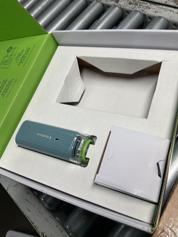 Photo 1 of ***MISSING PARTS***
Foodsaver Mini Handheld Vacuum Sealer Machine with Marinate Setting & Charging Dock | Cordless Food Vacuum Sealer for Freezer, Storage, Sous Vide, Meal Prep | Blue